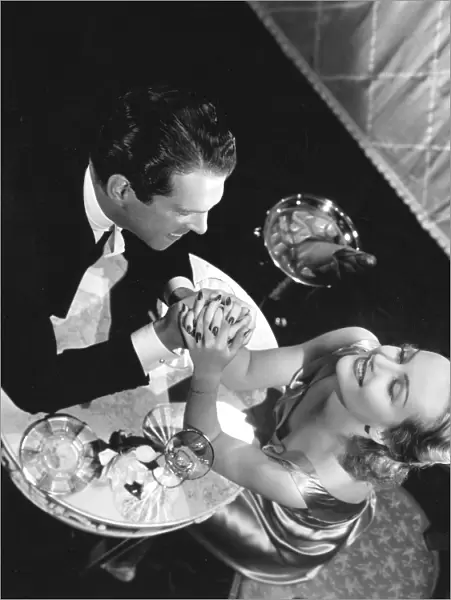 Fred MacMurray and Carole Lombard in Mitchell Leisens Hands Across the Table (1935)