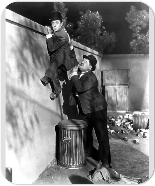 Stan Laurel and Oliver Hardy in James Parrotts Night Owls (1930)
