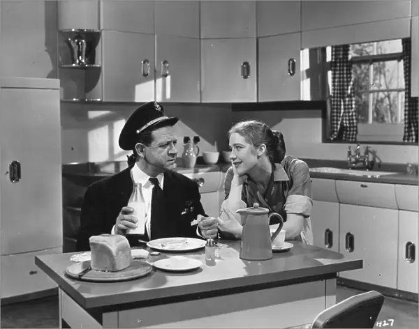 Sid James and Audrey Freeman in Maurice Elveys Is Your Honeymoon Really Necessary (1953)