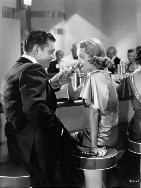 Clark Gable and Constance Bennett in Robert Z Leonards After Office Hours (1935)