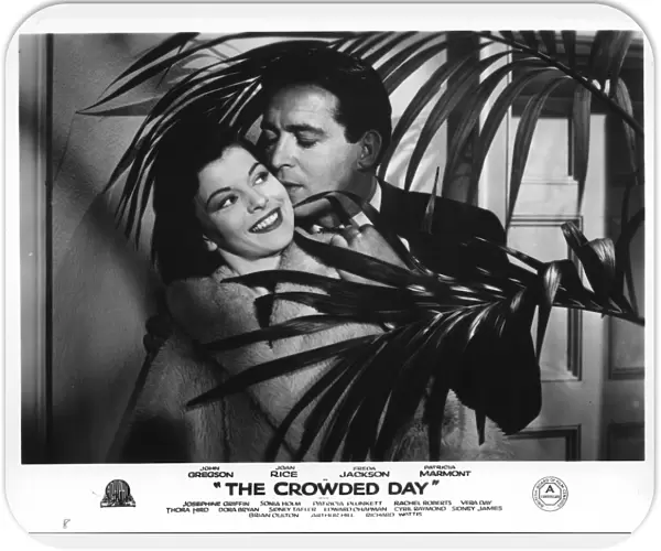 Joan Rice and John Gregson in John Guilleramans The Crowded Day (1954)