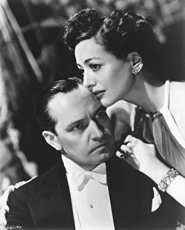 Classic Portraits Collection: Frederic March and Joan Crawford in George Cukors Susan and God (1940)