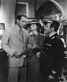 Images Dated 4th January 2013: Paul Henreid, Ingrid Bergman, and Claude Rains in Michael Curtizs Casablanca (1942)